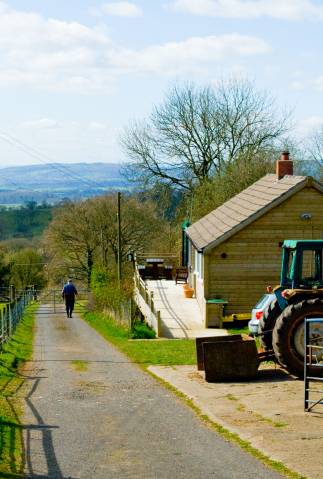 Farmer in Lane with panoramic view of Shropshire